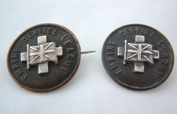 2 Empire Service League badges with silver centres, possibly military related